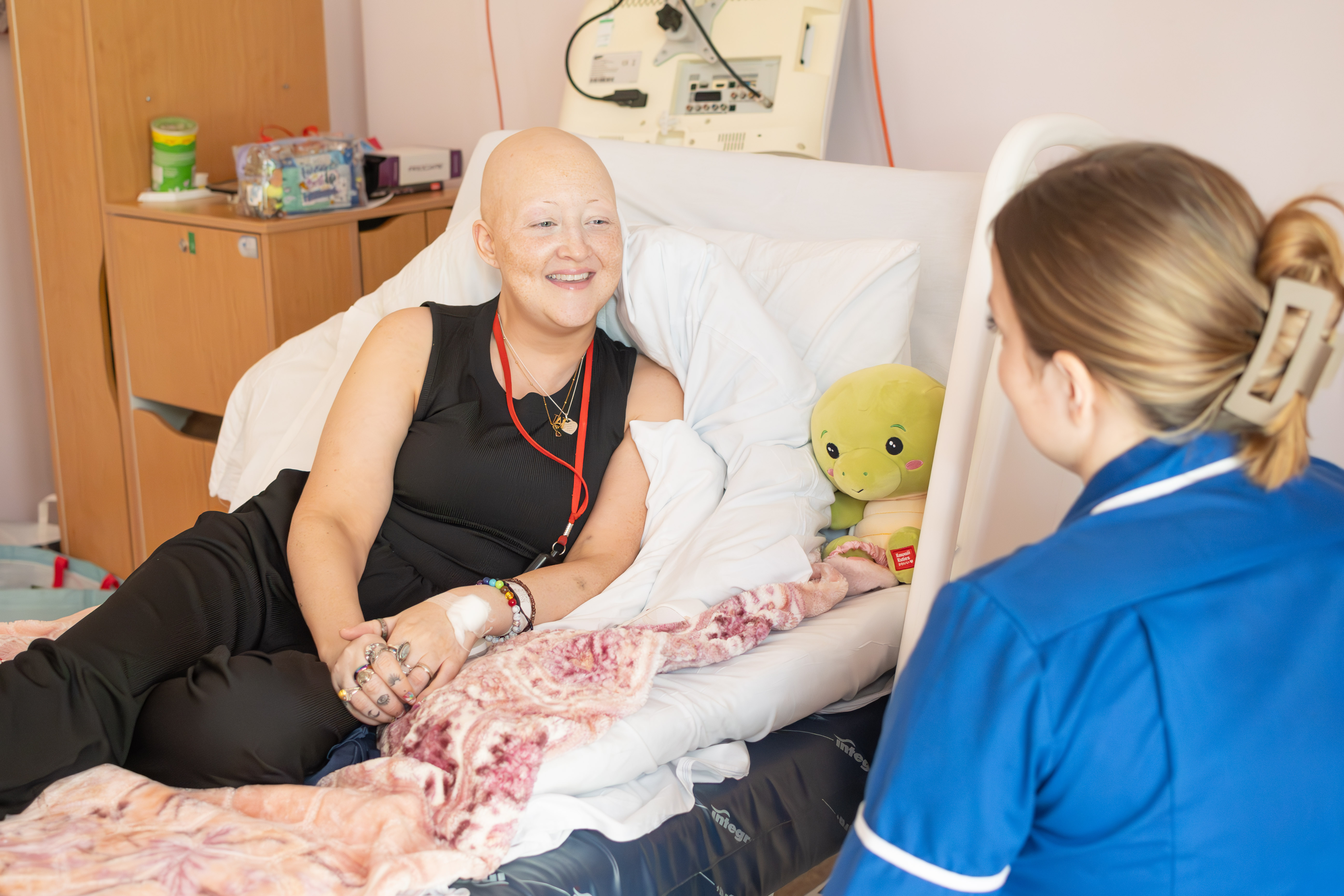 A Myton nurse laughing with a patient